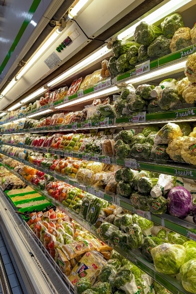 Fresh vegetables and fruit isle at grocery store